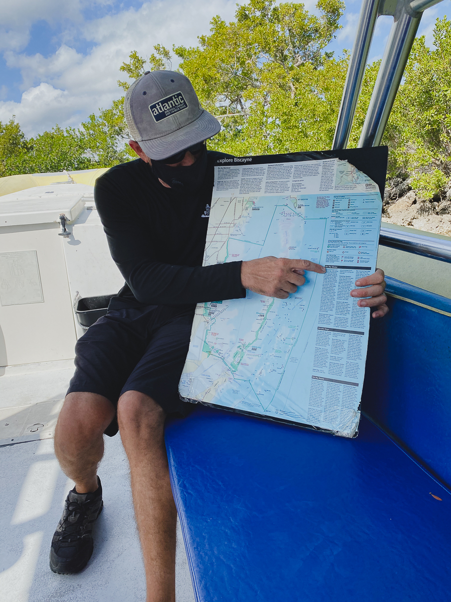 Private tour guide, Hans, explaining the map and history of Biscayne National Park.