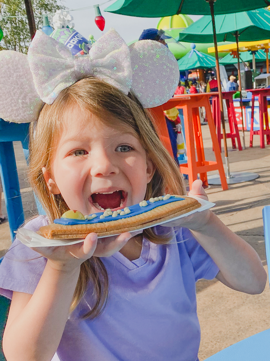 Enjoying a Poptart at Woody's Lunchbox in Toy Story Land at Disney World's Hollywood Studios